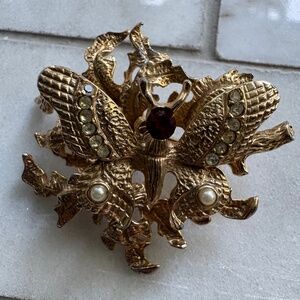 vintage butterfly on flowers brooch moveable